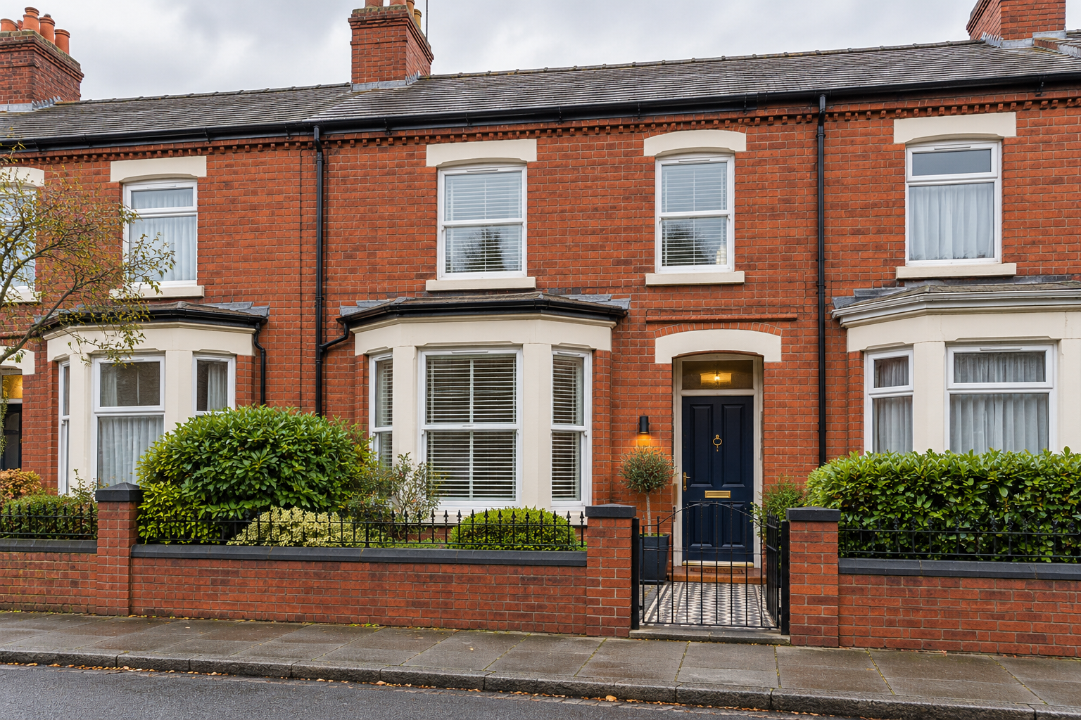 Illustrative photograph of a red-brick North West terraced home
